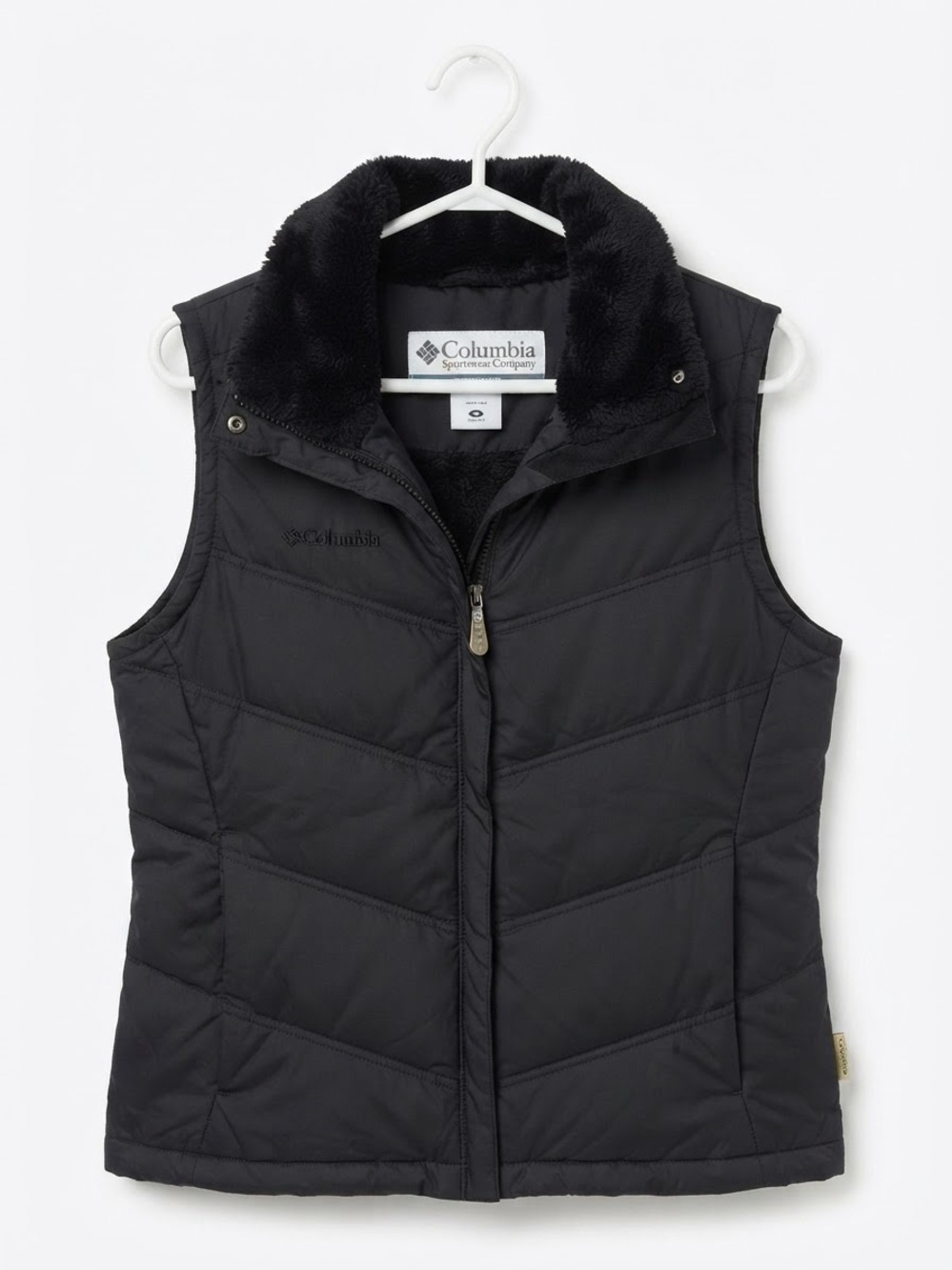 Columbia Women's Joy Peak Insulated Vest featuring a plush faux-fur lined collar